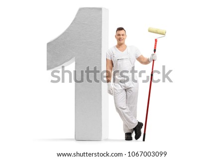 Full length portrait of a painter with a paint roller leaning against a number one figure isolated on white background