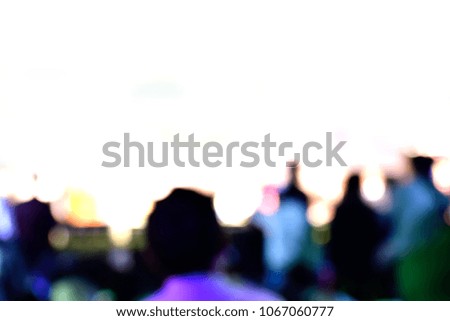 Audience in a concert against white background.