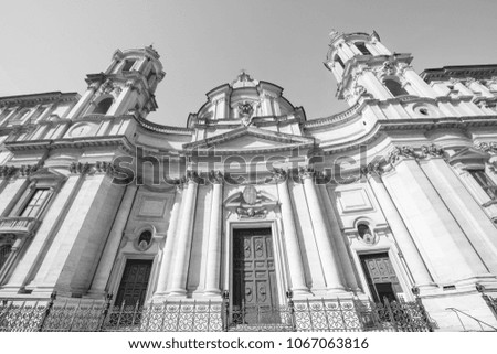 Black and white picture of the beautiful architecture church at Piazza Navona in Rome, Italy