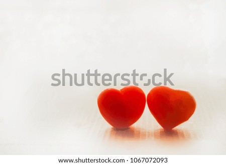 Two red hearts on white
background.Valentine concept