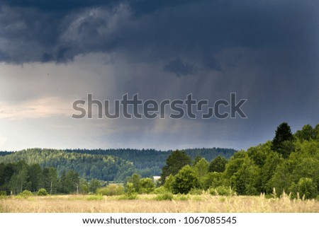 Stormy sky over the field