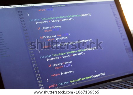 PHP back-end code. Computer programming source code. Abstract screen of web developer. Digital technology modern background. Code is created by myself.