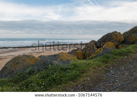 scenic atlantic coastline with sandy beach with waves, bidart, basque country, france