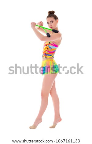 young beautiful slim woman doing gymnastics with maces isolated on white background