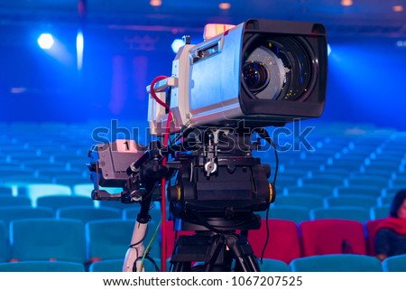 TV camera for shooting live events TV Broadcasting with a large lens in the Concert Hall