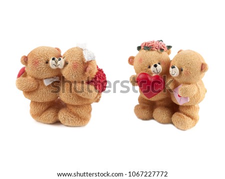Cute bear holding a red heart valentines day concept on white background
