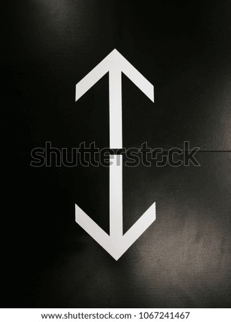 a arrow for point to walking in the mall