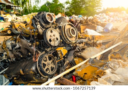 Industry recycle engine. Engine wreck from caught fire kept for recycle. Machine technician separate and classification part of iron or steel car machine wreck for easy worker or labor to recycling 