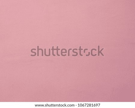 A monotonous empty pink wall. Background structure.