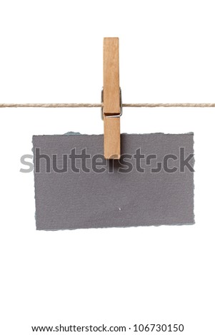 close up of  a note and a clothes peg on white background with clipping path