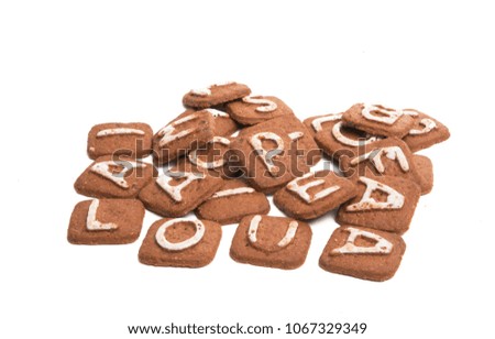 biscuits with letters isolated on white background
