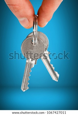 Hand Holding key in front of vignette