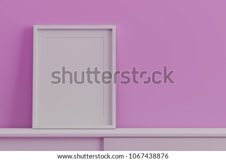 Blank white picture frame template for place image or text inside in a living room. pink wall color.