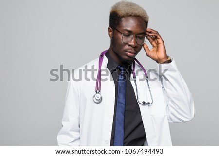 Closeup shot of African American doctor in white uniform isolated on white background with stethoscope
