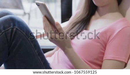 asia woman use phone and touch screen