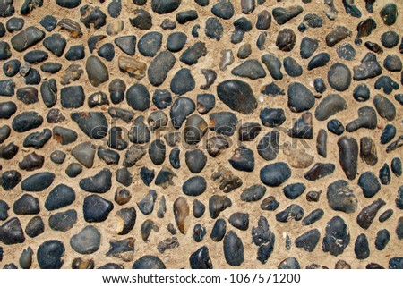 round stone in the wall texture background