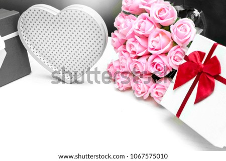 gift box with pink rose flower for lover valentine for background, mix color black and white tone