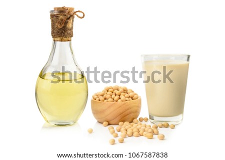 Soy Oil and soy milk with soy beans isolated on white.