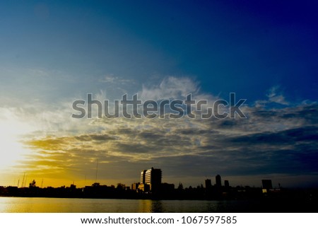 golden blue sky sunrise over building