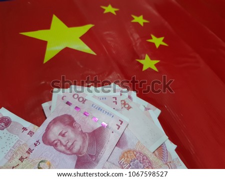 Chinese officials are studying ways to reduce the yuan if the USA builds a tax shield.

