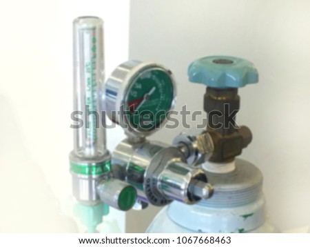soft photo and out of focus: Oxygen Medical Regulator and tank