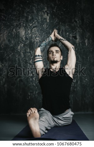 Various difficult yoga poses. Yoga teacher doing exercises on yoga.