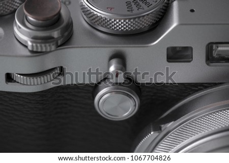 close up of vintage camera, shallow depth of field, old film look effect