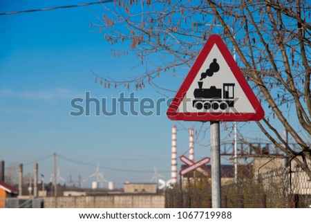 Railway level crossing ahead warning signs