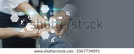 Business partnership meeting concept. Successful businessmen handshaking,virtual connection graphic screen. Royalty-Free Stock Photo #1067734091