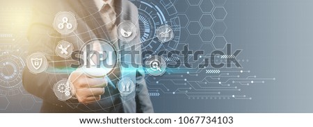 Key Performance Indicator (KPI) using Business Background with infographic versus planned target, person touching screen icon, success concept. Royalty-Free Stock Photo #1067734103