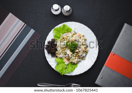 Russian winter salad , the lettuce leaf decor dark background fabric