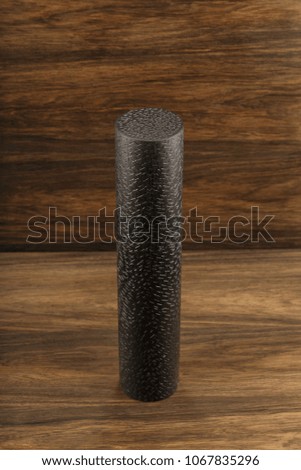 Wooden object on a wooden background, texture of a sea oak