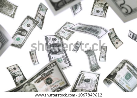 Flying American dollar banknotes, isolated on white background