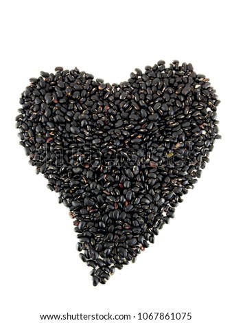 Black beans heart on white background
