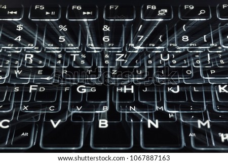 Abstract background of a zooming keyboard long exposure. Hacker concept.