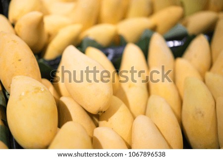 Full frame shot of ripe mangoes for sale at Bangkok 