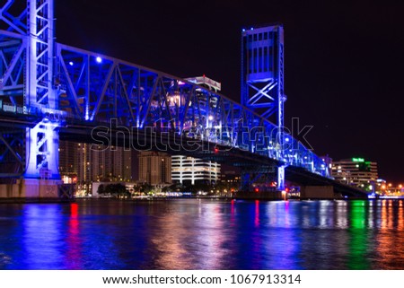 night shot of the blue main street bridge over the st johns river in jacksonville florida
