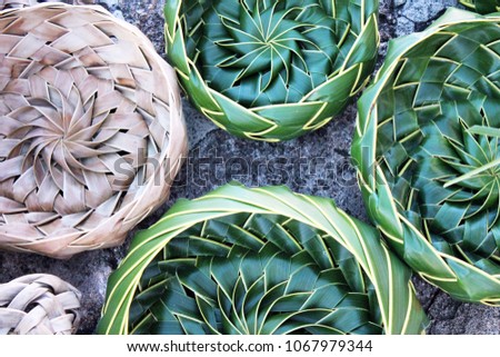 coconut palm leaf leaves Basket bowls woven out of palm leaves in Caribbean Antigua also common in Asia and Thailand stock, photo, photograph, picture, image