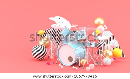 Blue drum amidst colorful balls on pink background. - 3d render.