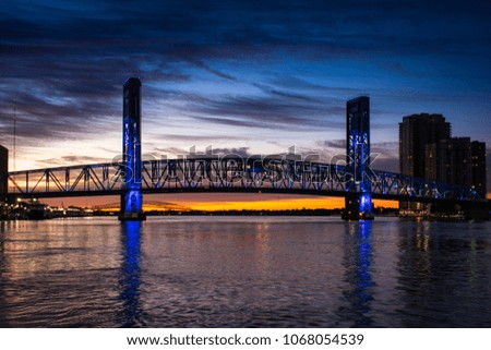 main street bridge in jacksonville florida with sunrise in background