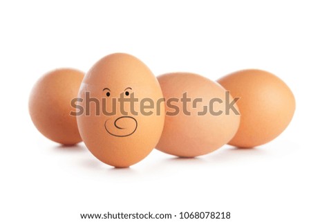 Chicken eggs with funny emoticons isolated on white background