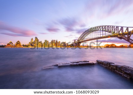 Opera House and Harbour Bridge landmarks building in Sydney city skyline, Australia.