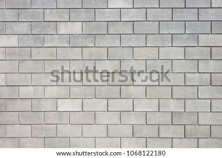 Wall of cement blocks. Background and texture Royalty-Free Stock Photo #1068122180