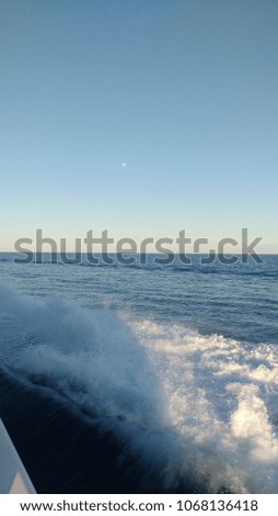 Moon view during the evening from a boat 