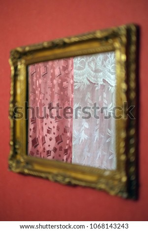 A picture from a mirror. Reflection of curtains in a mirror image
