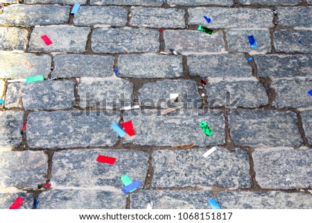 colorful confetti scattered on the ground 
