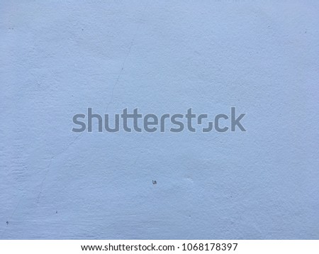 Light blue concrete wall background