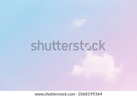 Single cloud with pastel sky background