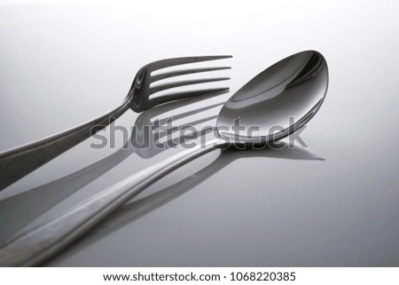 Fork & Spoon Kitchen Utensils fine art abstract on white isolated background