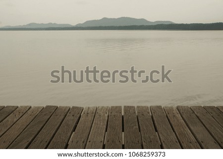 close up wooden bridge with river front to sit for peace and relax
